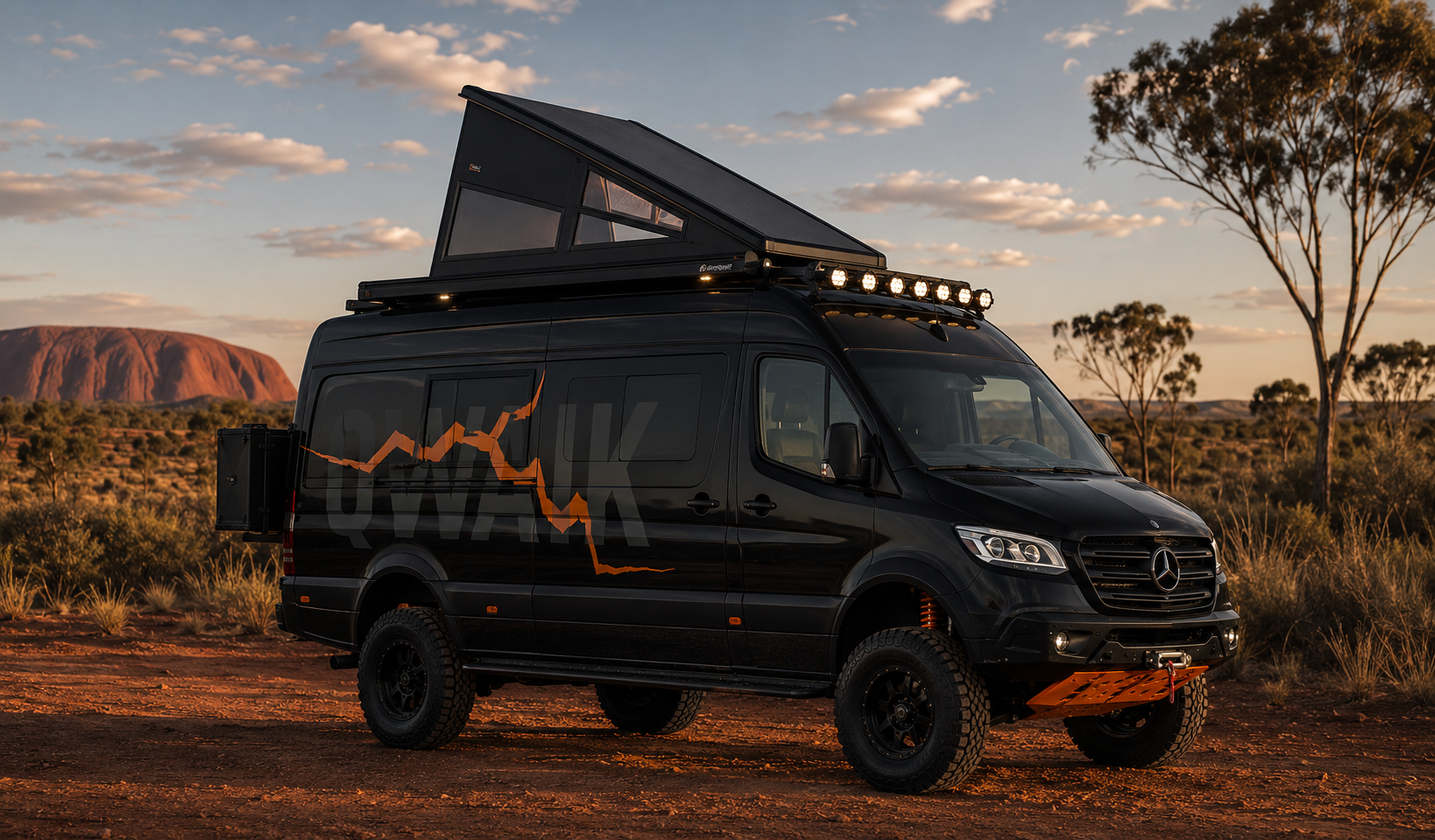 Blacked-out QWAIK 4x4 camper van with orange suspension in the outback at sunset